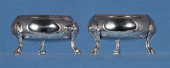 A pair of Victorian silver circular bun salts, 7.8oz/244 grams.